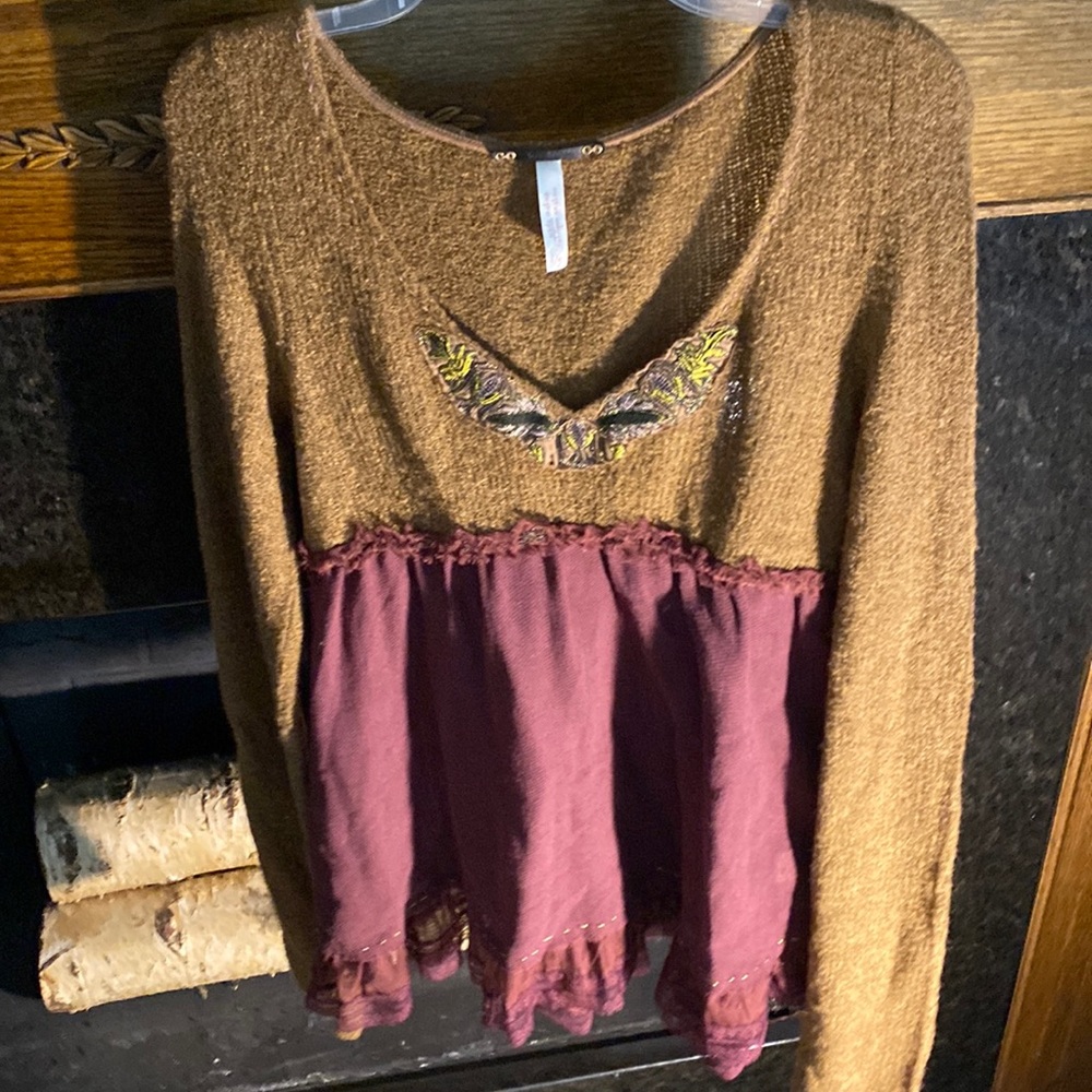 Free people. Large. Runs a bit small.